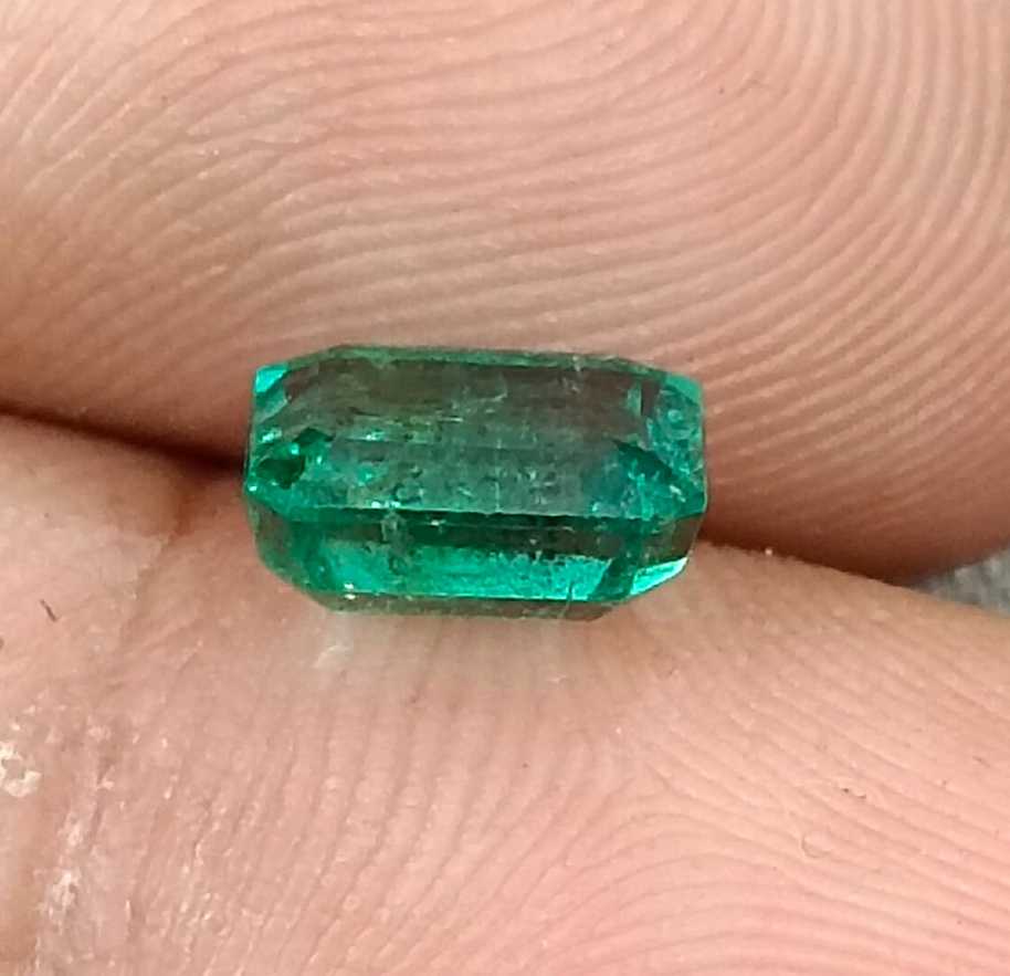 1.57cts GSI USA certified natural medium deep green emerald cut Zambian emerald 