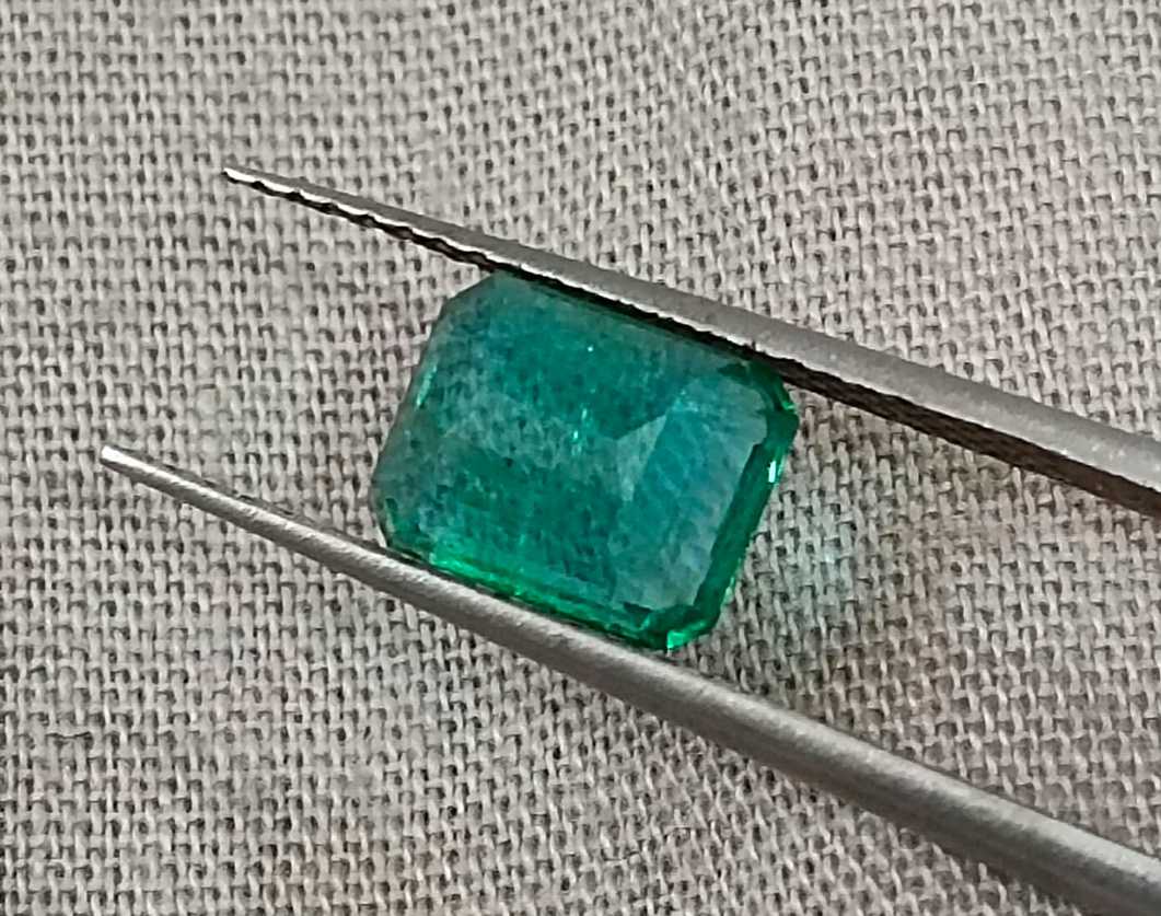 1.57cts GSI USA certified natural medium deep green emerald cut Zambian emerald 