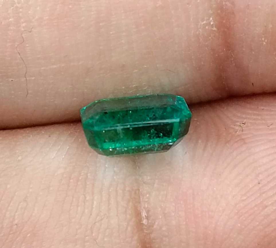 1.57cts GSI USA certified natural medium deep green emerald cut Zambian emerald 