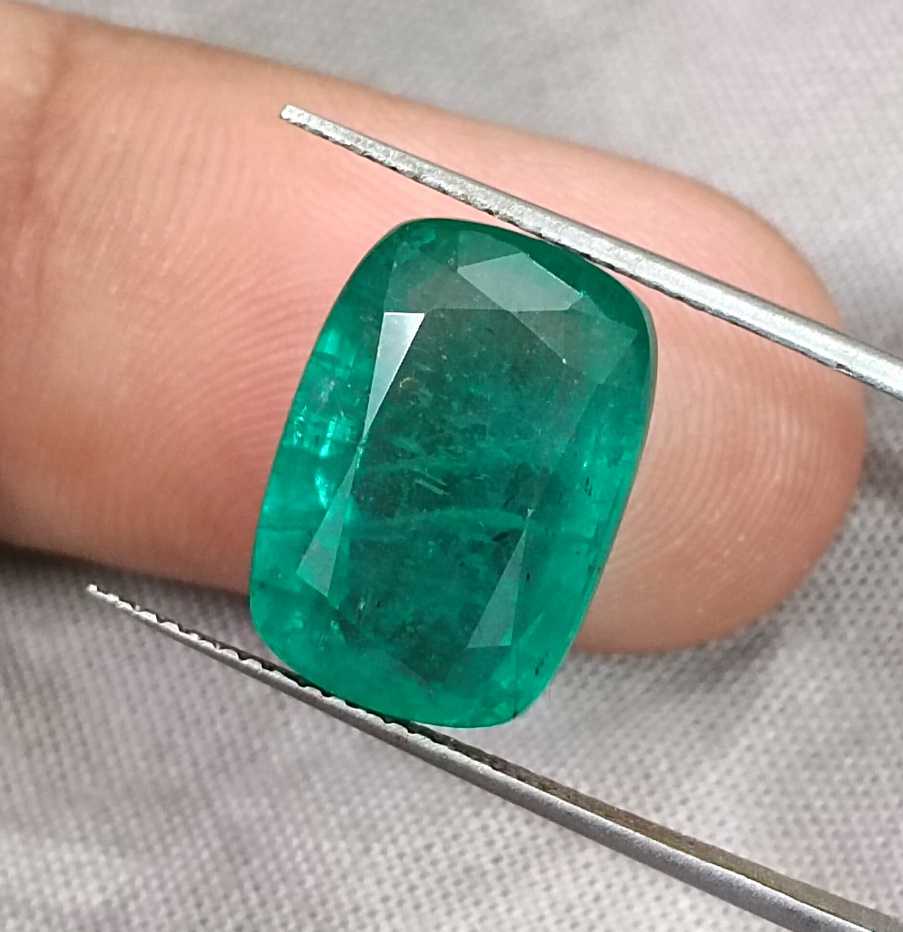 9.75ct Medium deep green cushion cut Zambian emerald.