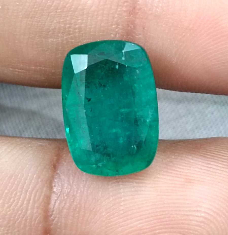 9.75ct Medium deep green cushion cut Zambian emerald.
