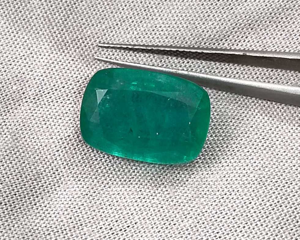 9.75ct Medium deep green cushion cut Zambian emerald.