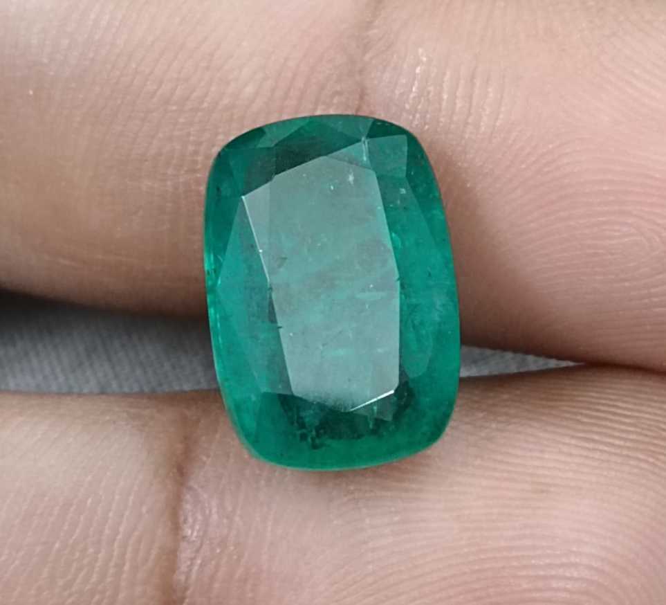9.75ct Medium deep green cushion cut Zambian emerald.