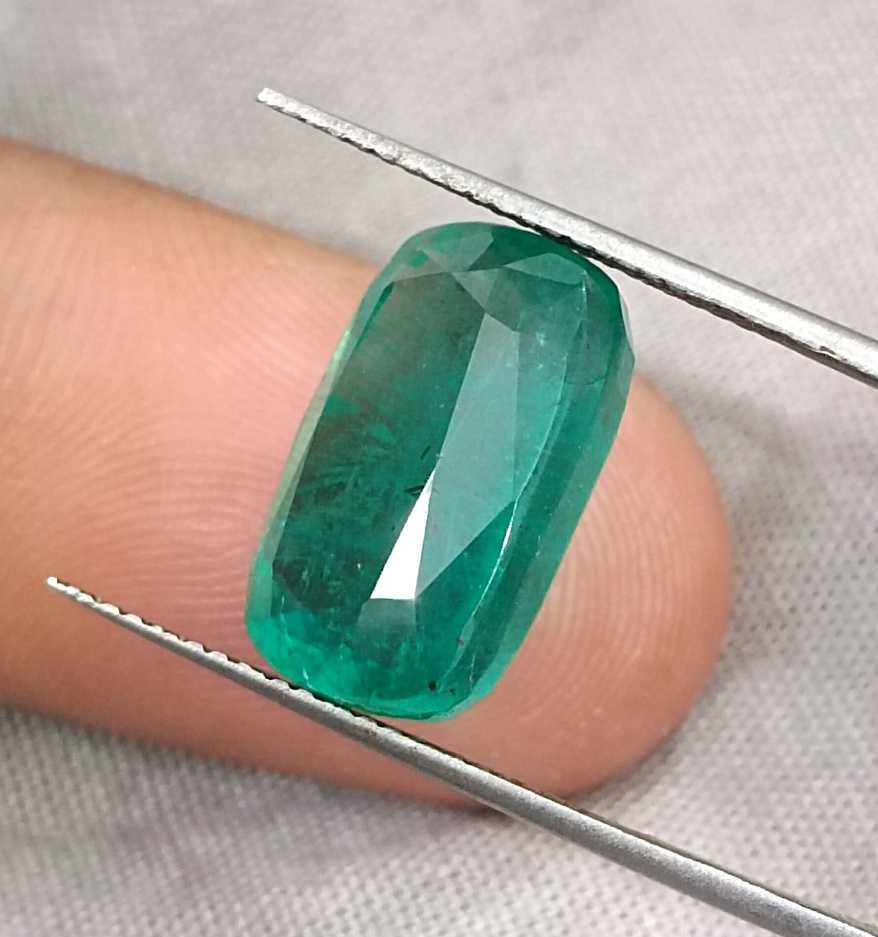9.75ct Medium deep green cushion cut Zambian emerald.