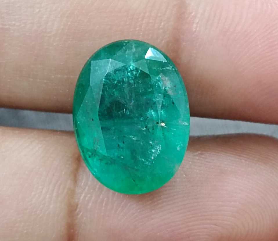 10.20ct Grass green oval cut Zambian emerald.
