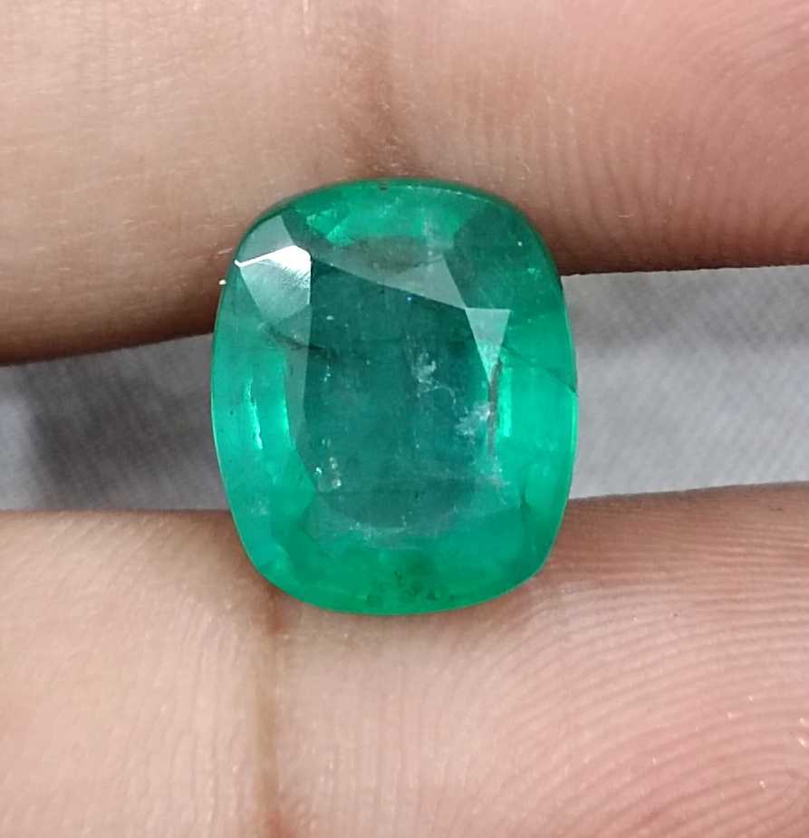 6.28ct Medium deep green cushion cut Zambian emerald.