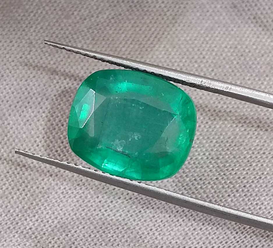 6.28ct Medium deep green cushion cut Zambian emerald.