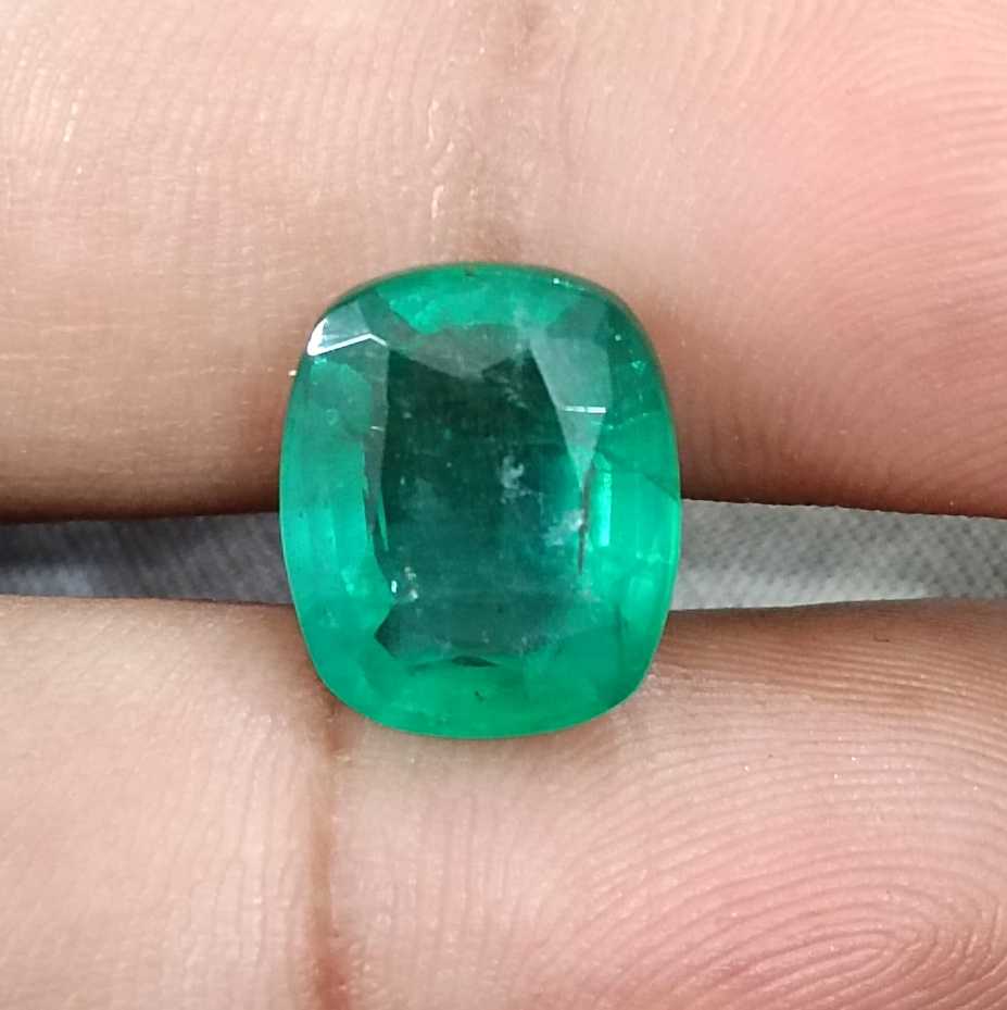 6.28ct Medium deep green cushion cut Zambian emerald.