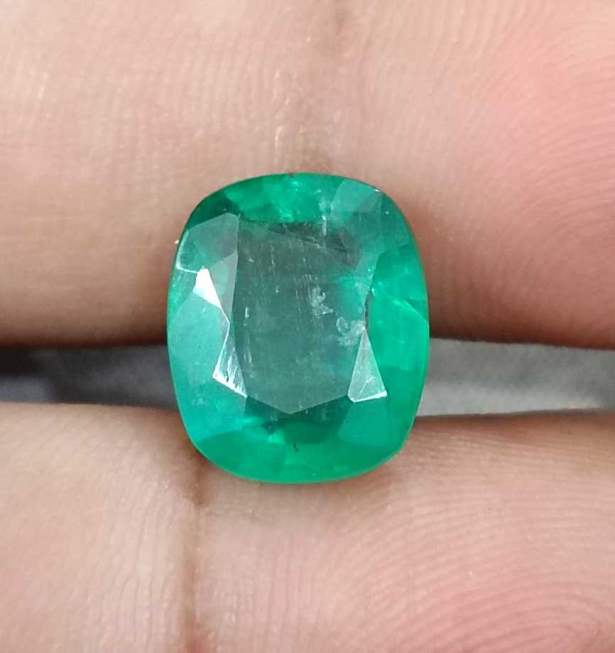 6.28ct Medium deep green cushion cut Zambian emerald.