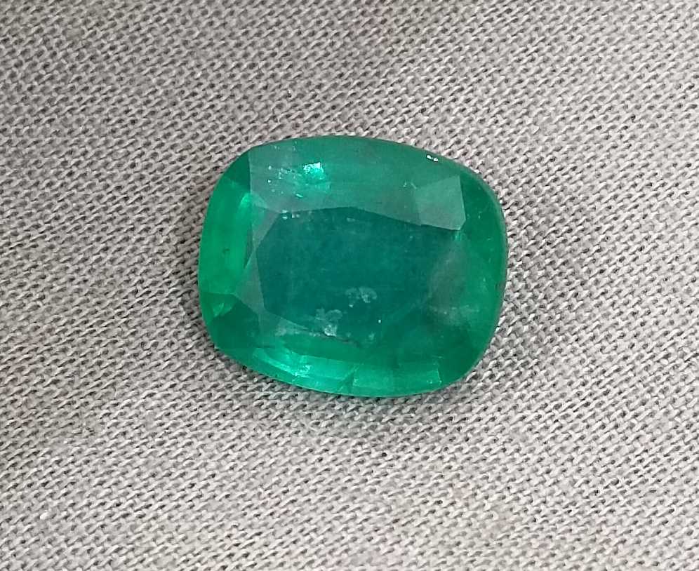 6.28ct Medium deep green cushion cut Zambian emerald.