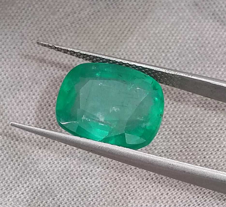 6.28ct Medium deep green cushion cut Zambian emerald.