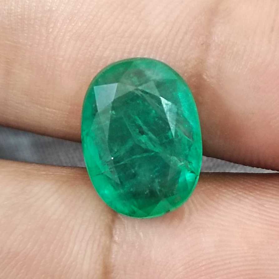 7.48ct Medium spring green oval cut Panjshir emerald.