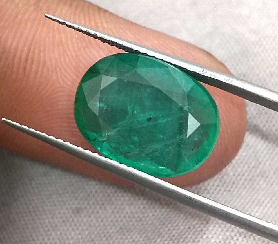 7.48ct Medium spring green oval cut Panjshir emerald.