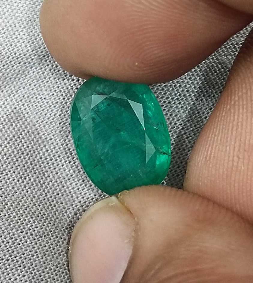 7.48ct Medium spring green oval cut Panjshir emerald.