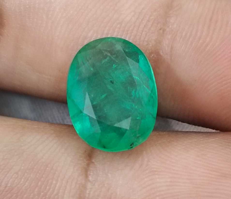 7.48ct Medium spring green oval cut Panjshir emerald.