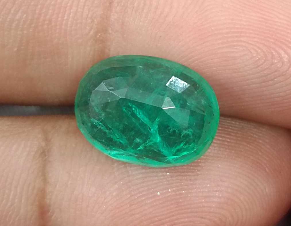 7.48ct Medium spring green oval cut Panjshir emerald.