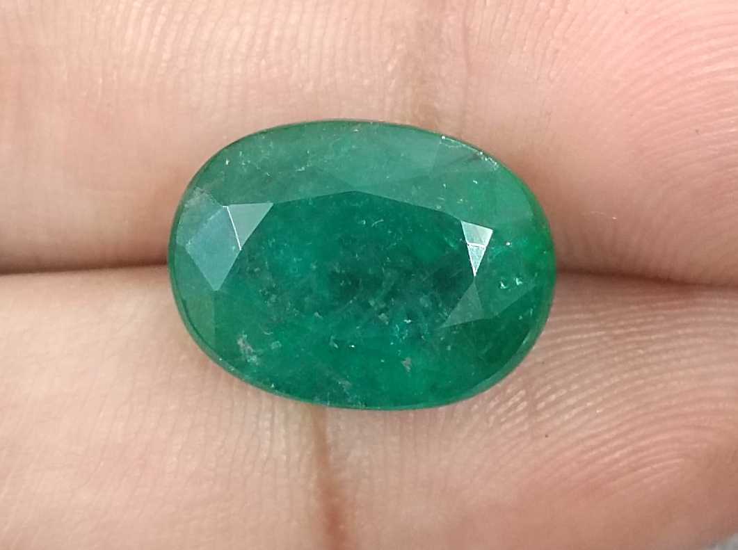 10.50ct Deep forest green oval cut Zambian emerald.