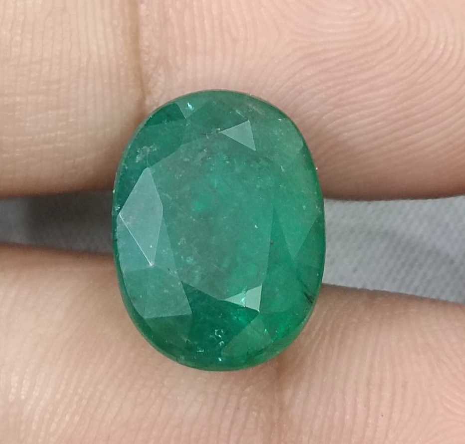 10.50ct Deep forest green oval cut Zambian emerald.