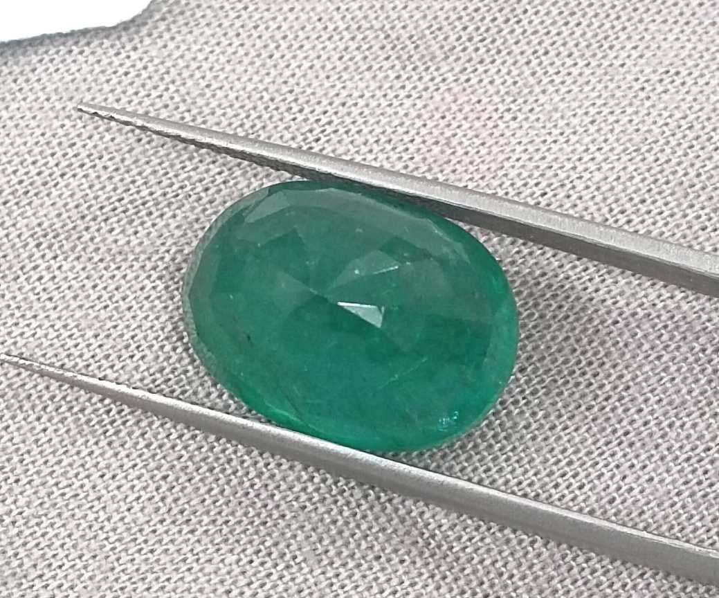 10.50ct Deep forest green oval cut Zambian emerald.