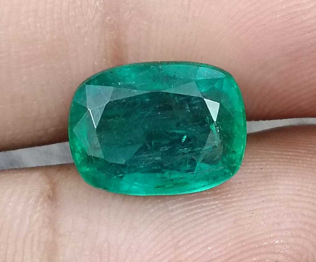 5.36ct Deep pure green cushion cut Zambian emerald.