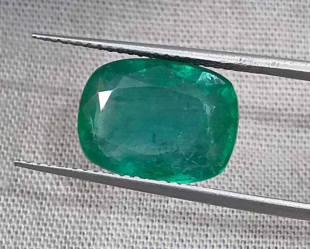 5.36ct Deep pure green cushion cut Zambian emerald.