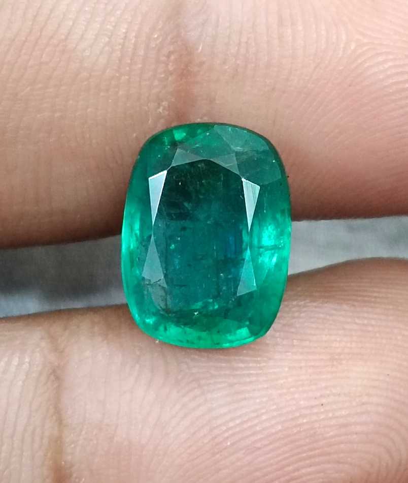 5.36ct Deep pure green cushion cut Zambian emerald.