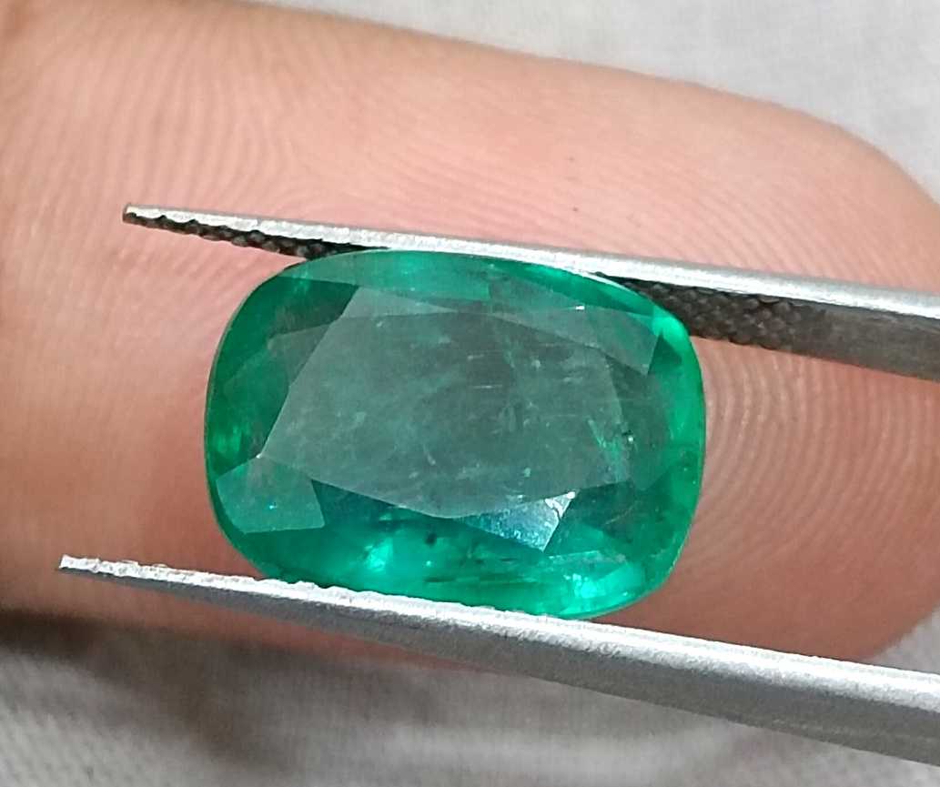 5.36ct Deep pure green cushion cut Zambian emerald.