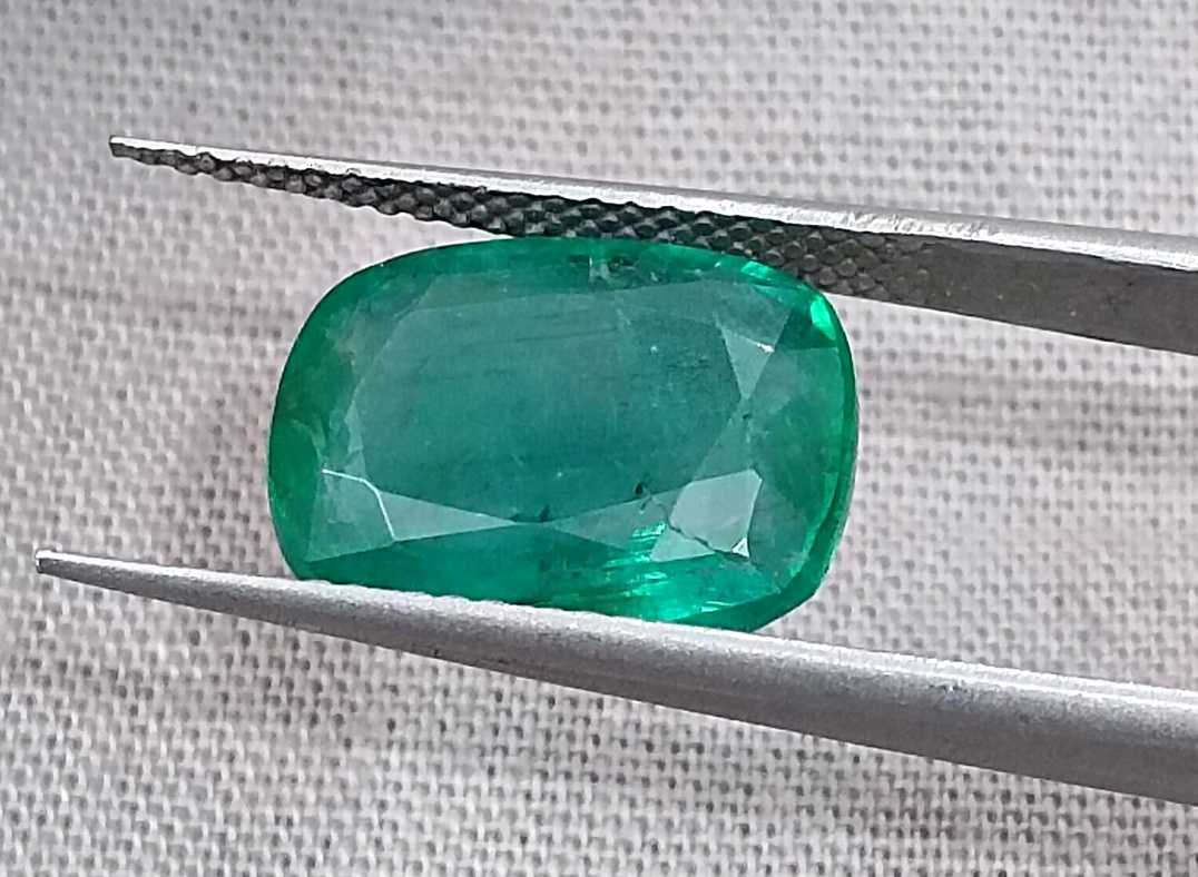 5.36ct Deep pure green cushion cut Zambian emerald.