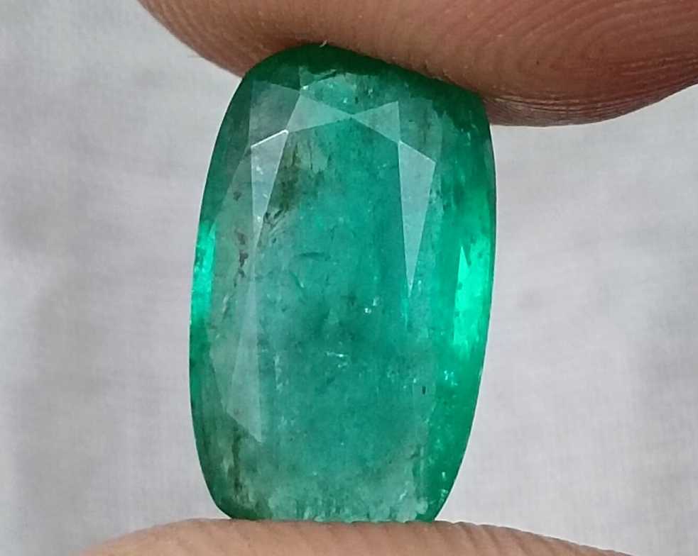 3.99ct Deep green cushion cut Zambian emerald.