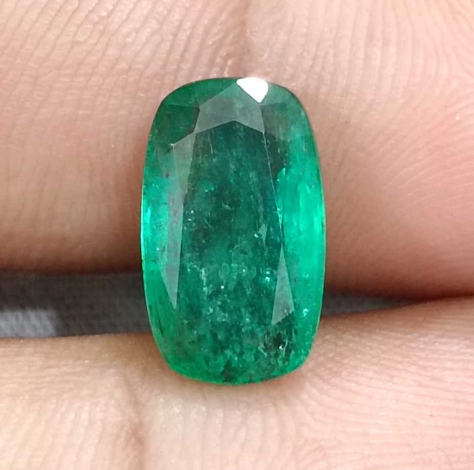 3.99ct Deep green cushion cut Zambian emerald.
