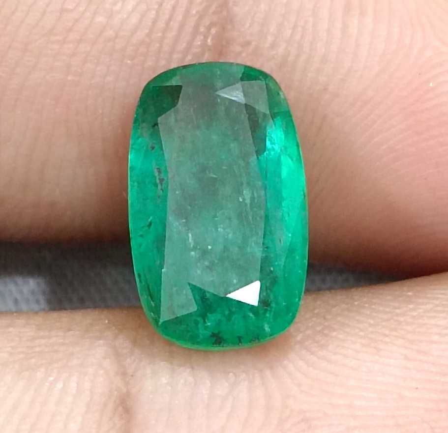 3.99ct Deep green cushion cut Zambian emerald.