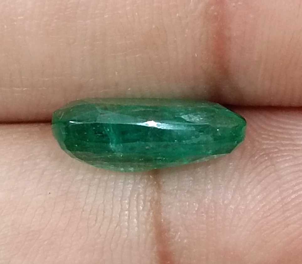 3.99ct Deep green cushion cut Zambian emerald.