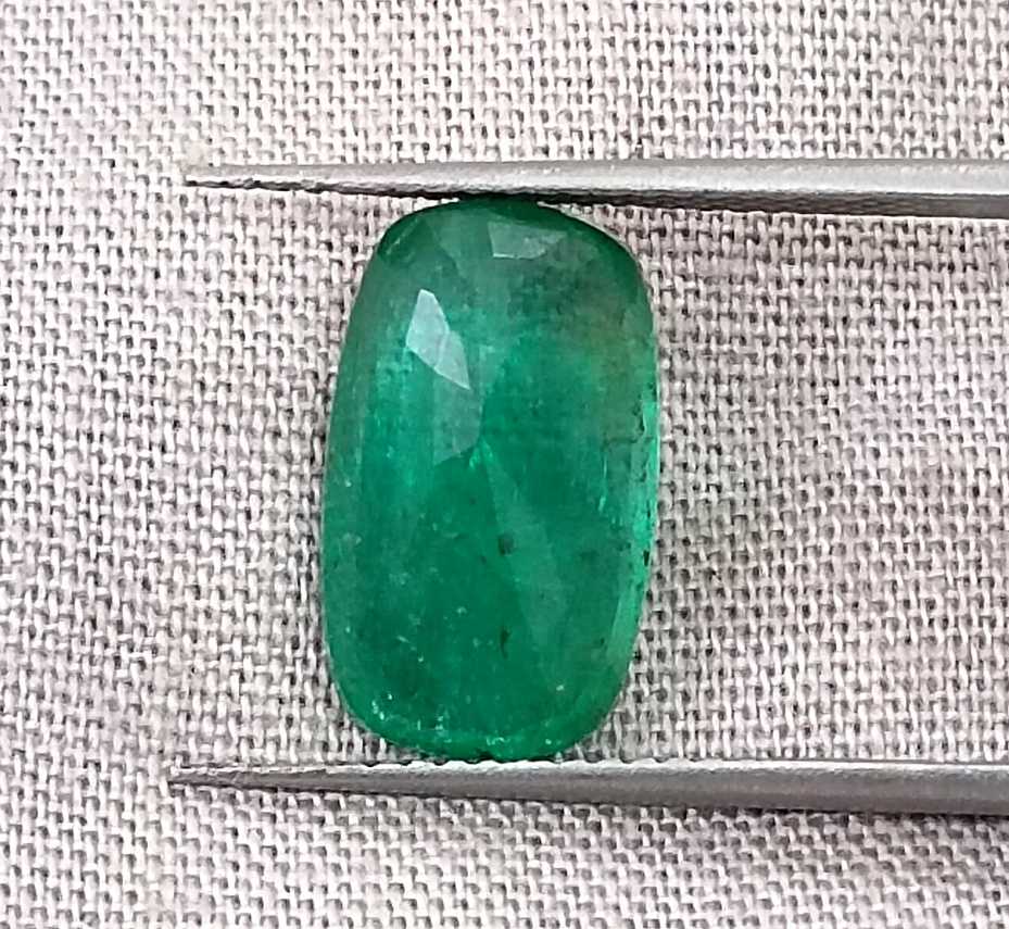 3.99ct Deep green cushion cut Zambian emerald.