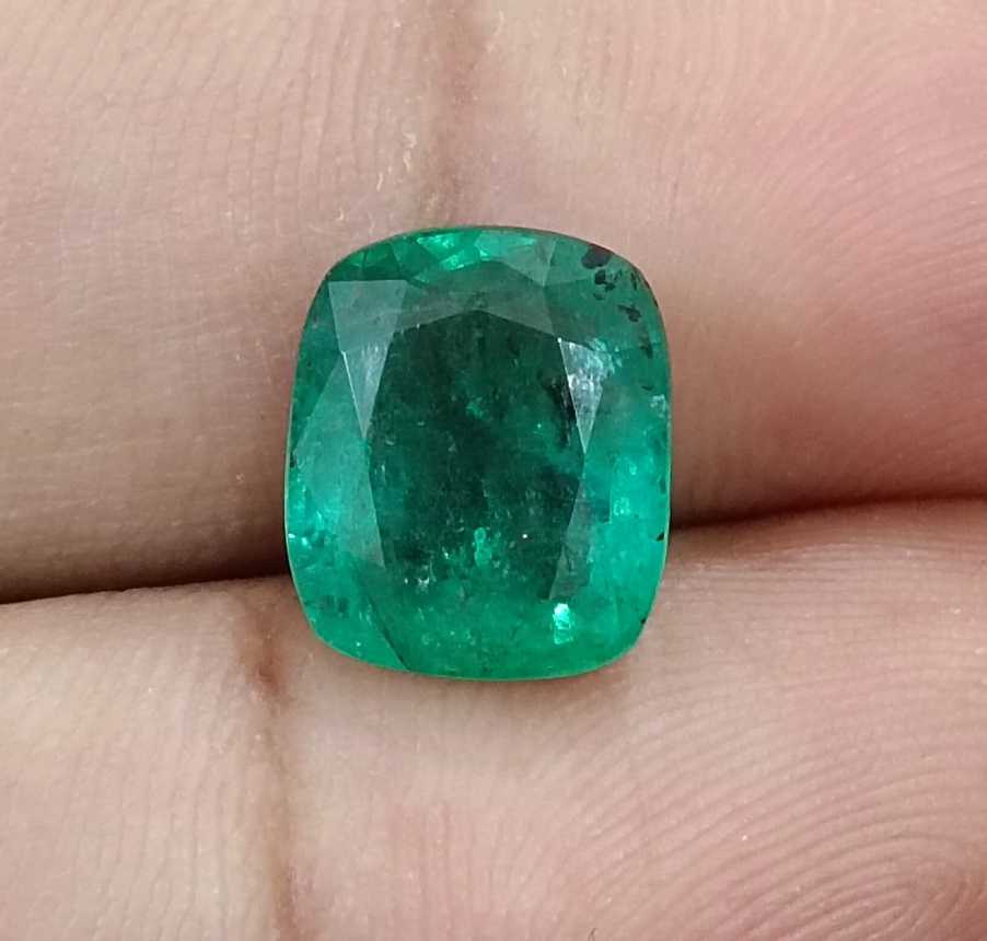 4.25ct Medium deep green cushion cut Zambian emerald.