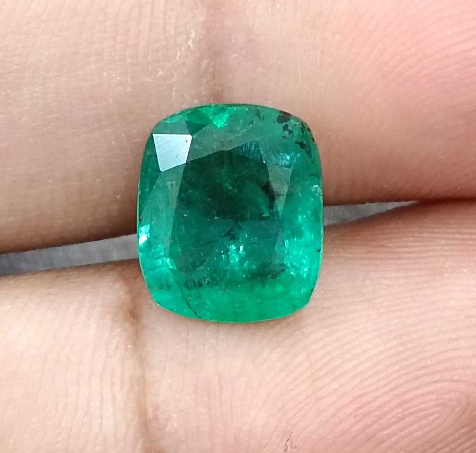 4.25ct Medium deep green cushion cut Zambian emerald.
