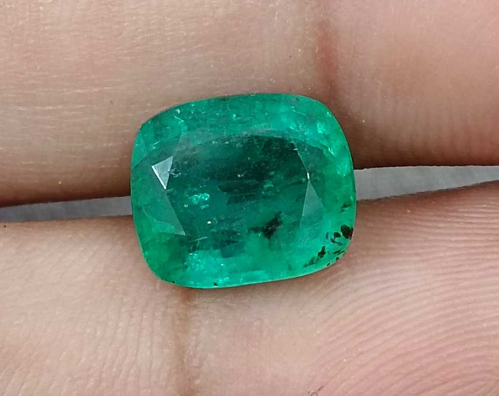 4.25ct Medium deep green cushion cut Zambian emerald.