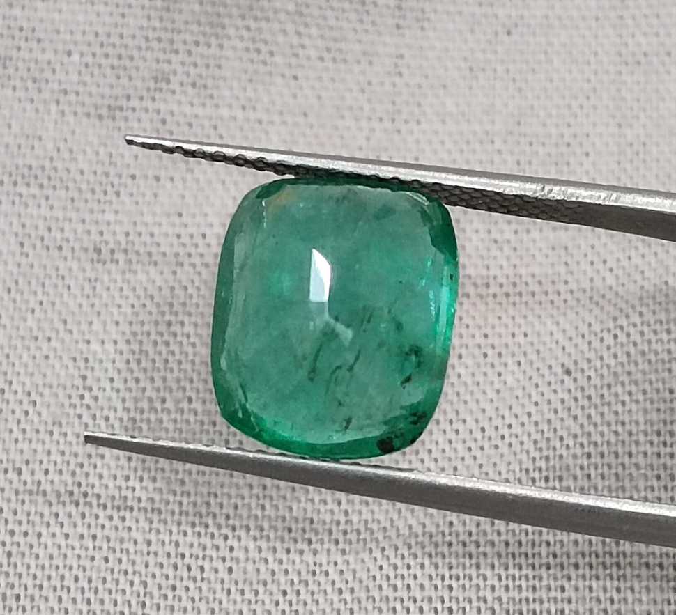 4.25ct Medium deep green cushion cut Zambian emerald.