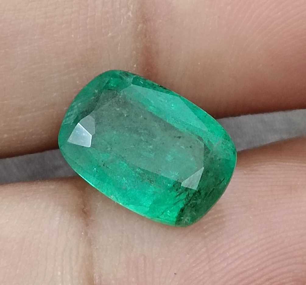 4.87ct Medium deep green cushion cut Zambian emerald.