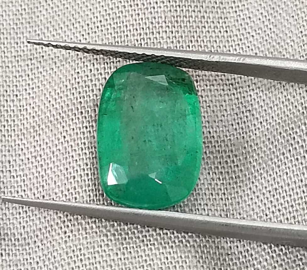4.87ct Medium deep green cushion cut Zambian emerald.