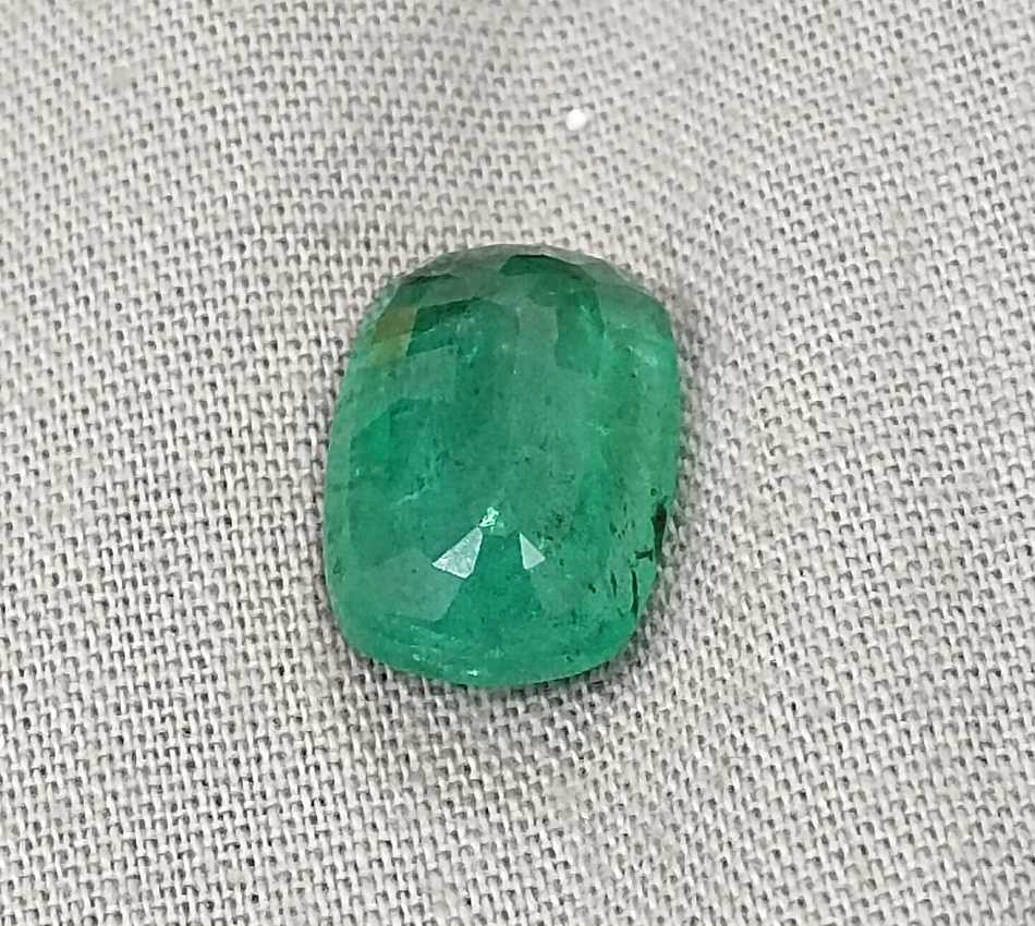 4.87ct Medium deep green cushion cut Zambian emerald.