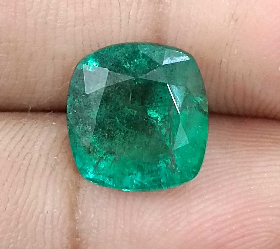 5.50ct Deep green cushion cut natural Zambian emerald.