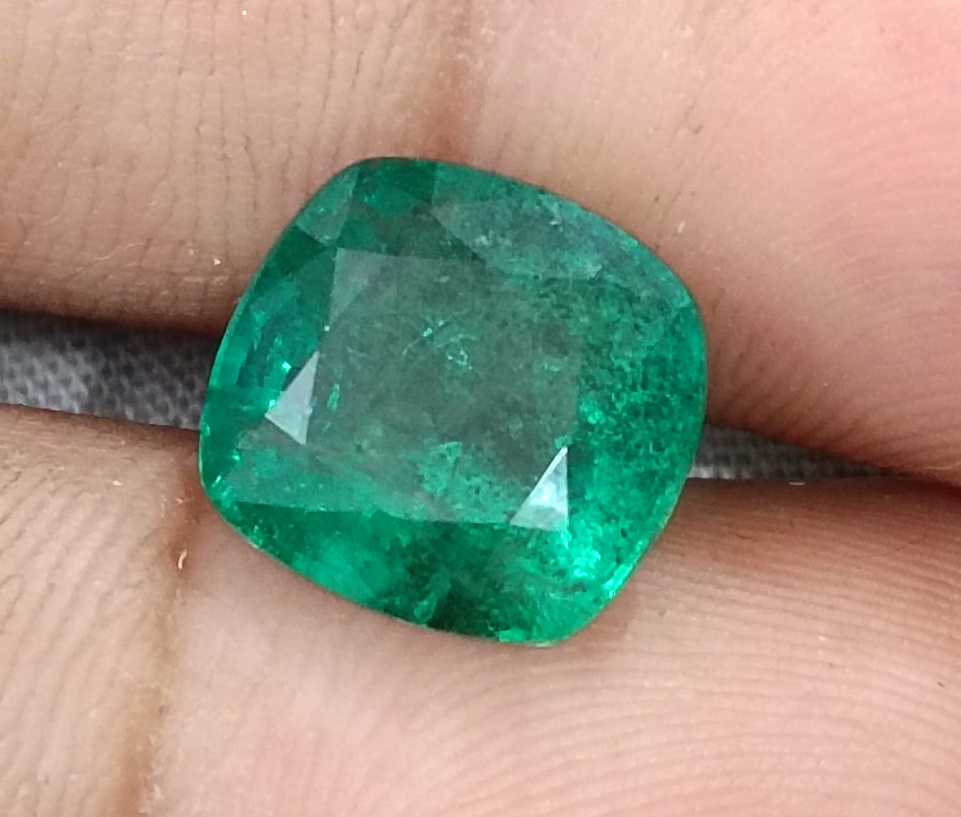 5.50ct Deep green cushion cut natural Zambian emerald.