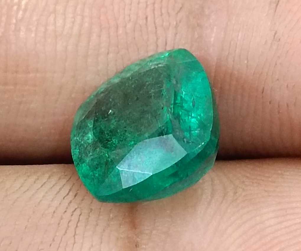 5.50ct Deep green cushion cut natural Zambian emerald.