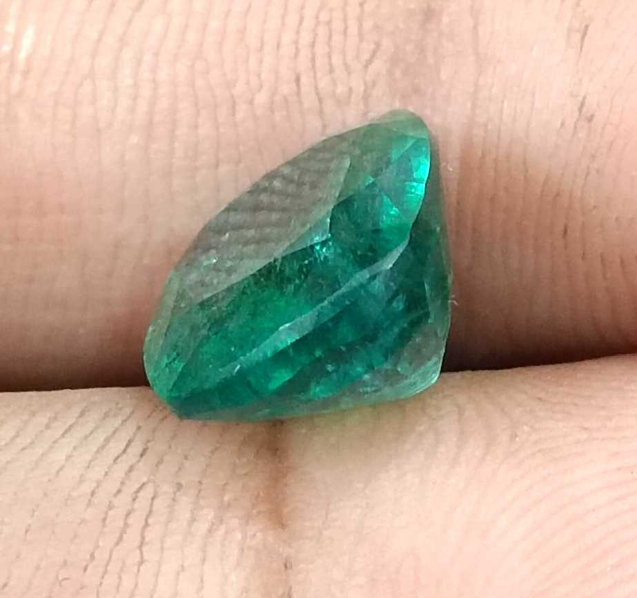 5.50ct Deep green cushion cut natural Zambian emerald.