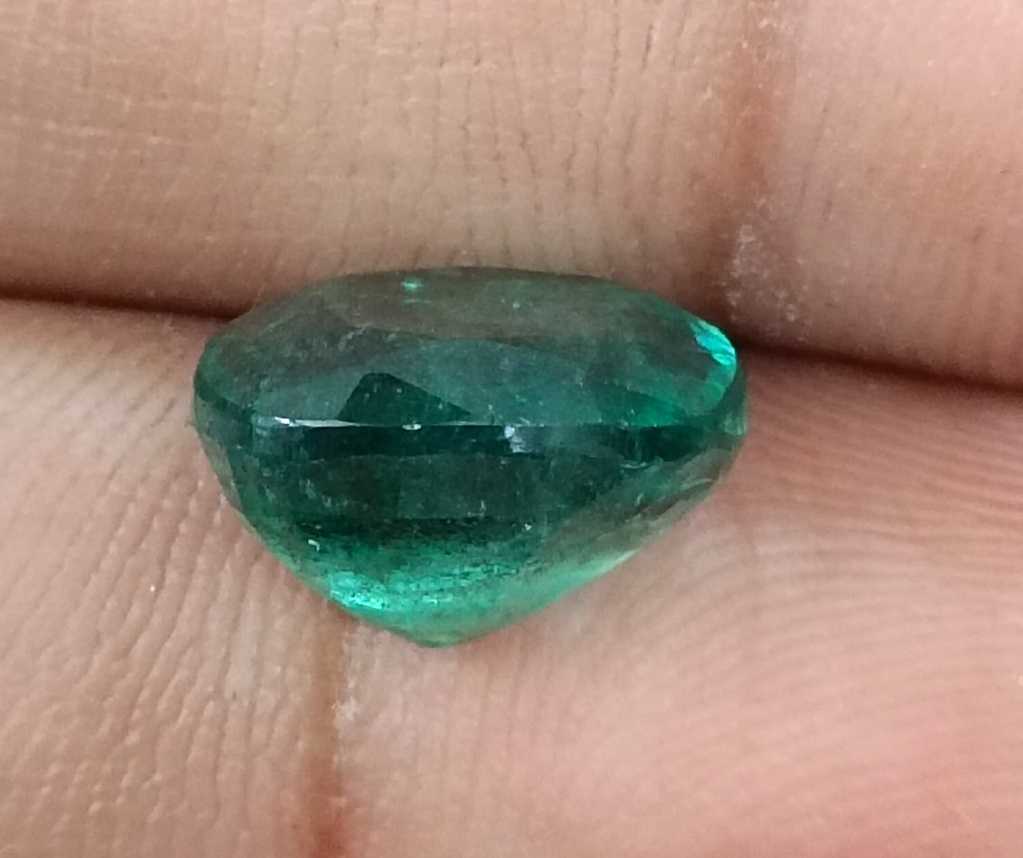 5.50ct Deep green cushion cut natural Zambian emerald.