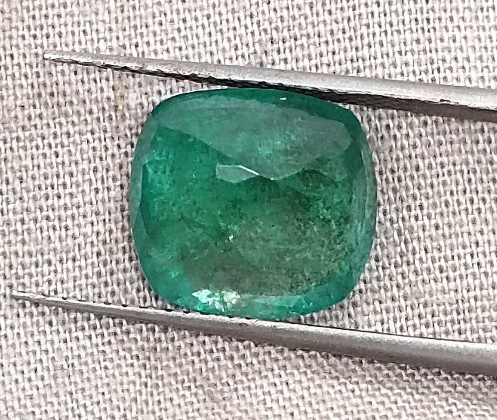 5.50ct Deep green cushion cut natural Zambian emerald.