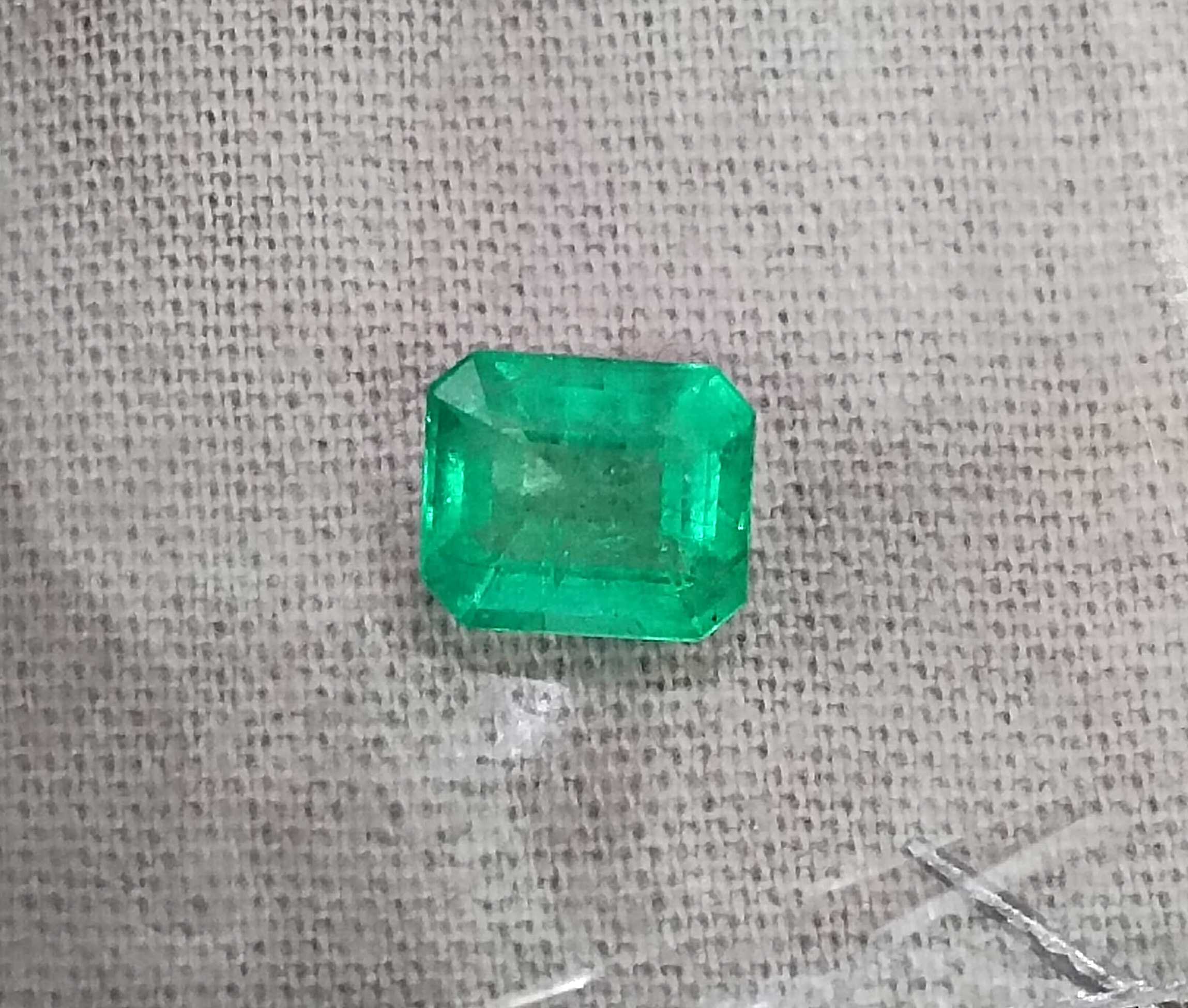1.07ct Panjshir emerald GSI certified neon green octagon cut gemstone