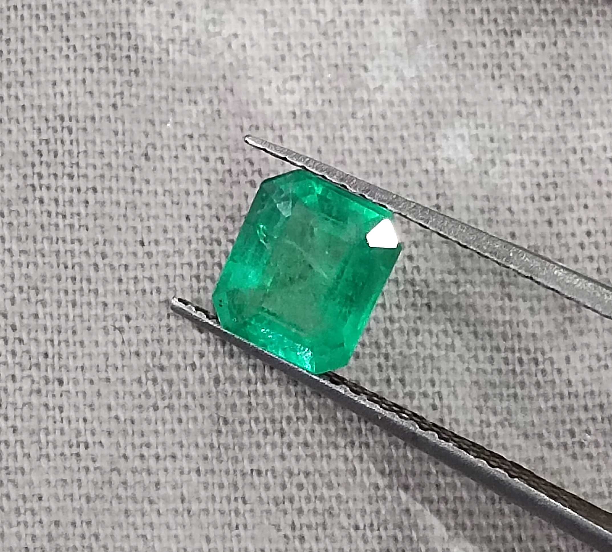 1.07ct Panjshir emerald GSI certified neon green octagon cut gemstone