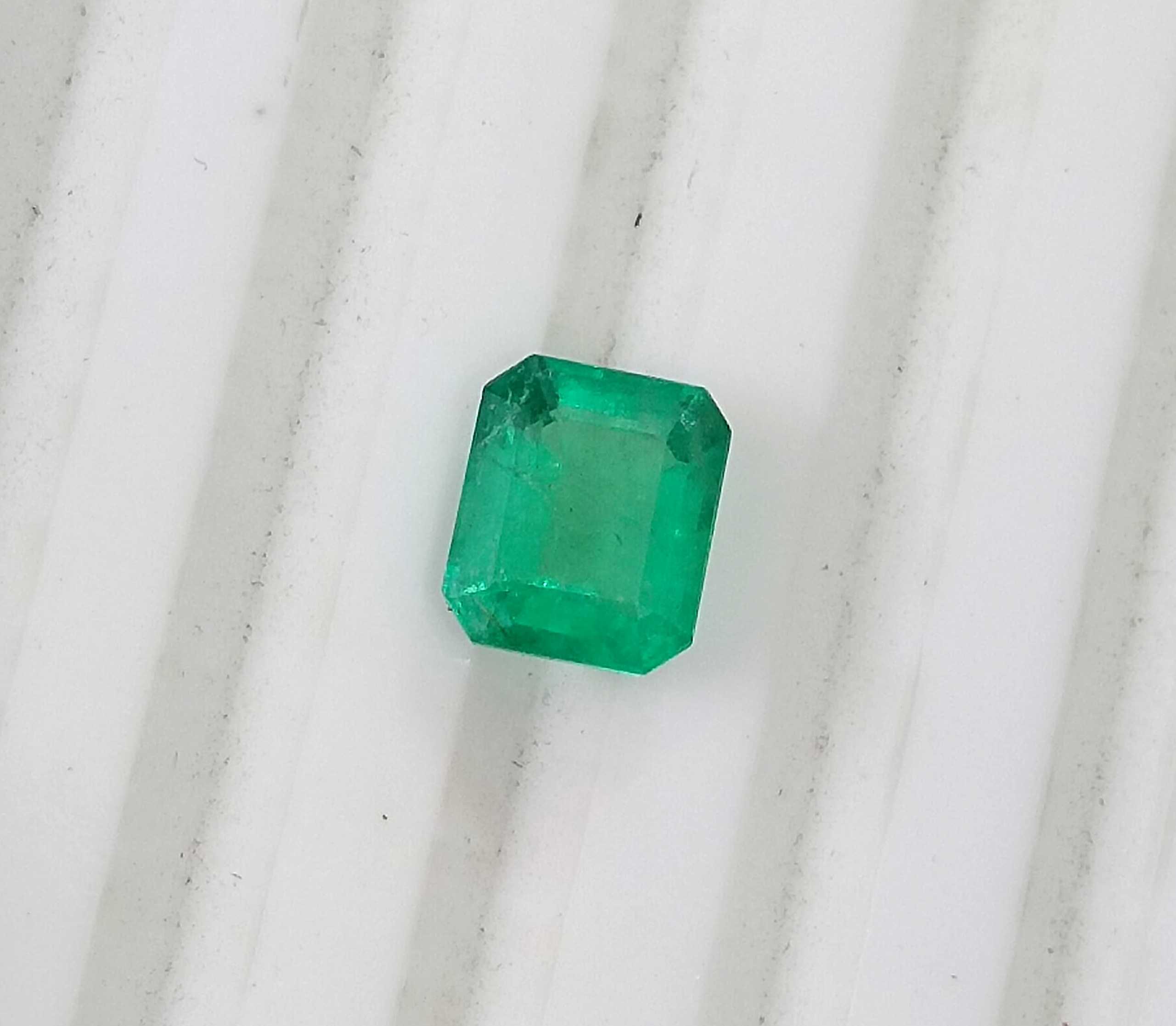 1.07ct Panjshir emerald GSI certified neon green octagon cut gemstone