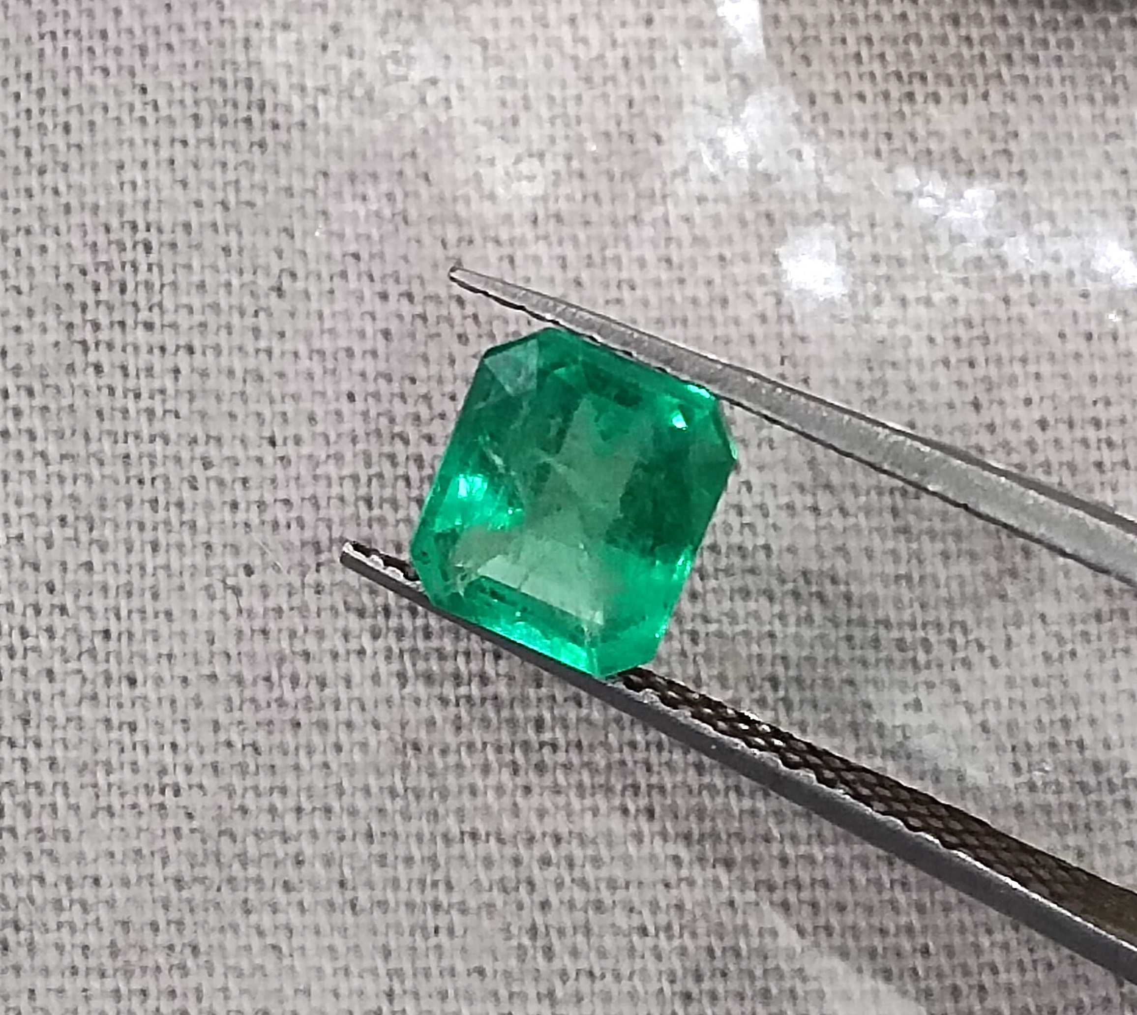 1.07ct Panjshir emerald GSI certified neon green octagon cut gemstone